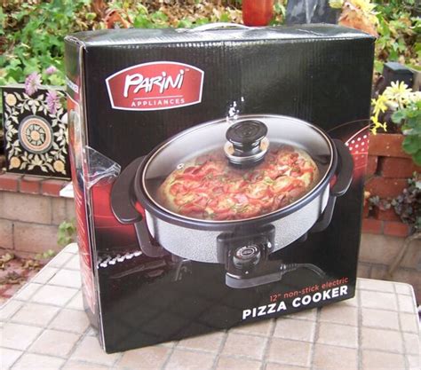 Bid in a Proxibid online auction to acquire a New Parini 12" Non-stick Electric Pizza Cooker and New Belgian Waffle Maker from Just Average Goods. . Parini pizza cooker